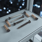 Lot de 4 vis relieuses acier noir 4x35mm avec 4 douilles non fendues