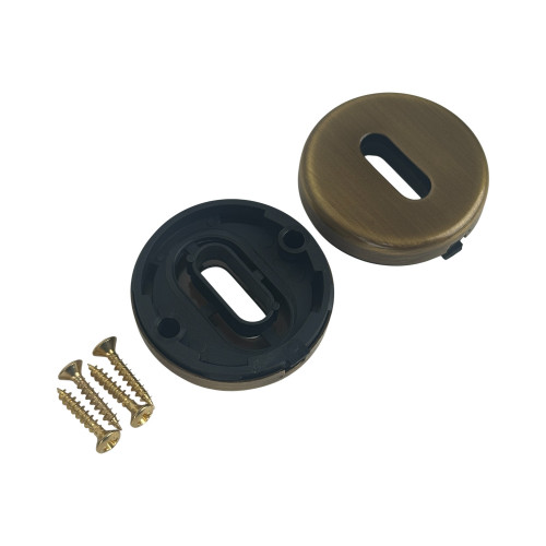 ROSACE RONDE EN LAITON PATINE CLE