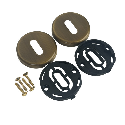 ROSACE RONDE EN LAITON PATINE CLE