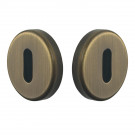 ROSACE RONDE EN LAITON PATINE CLE