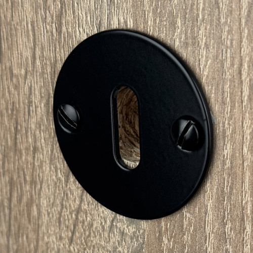 Rosace ronde fer noir clé