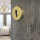 ROSACE ENTREE DE CLE LAITON POLI