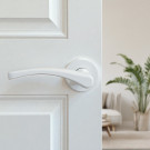 2 poignées de porte sur rosace ronde EVA, Aluminium blanc mat