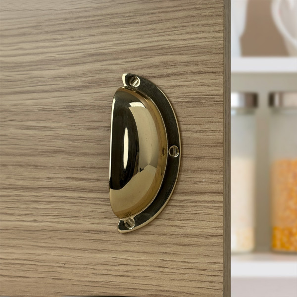 Poignée de meuble coquille laiton poli entraxe 32 mm