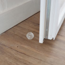 Butée de porte sol adhésive BOLL, Nylon blanc translucide