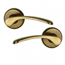 Poignée de porte sur rosace eva laiton patiné