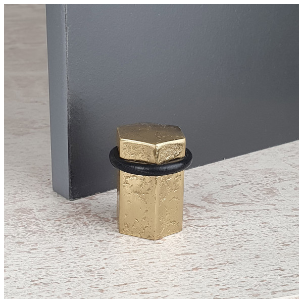 Butée de porte sol HEXAGONE, Laiton doré anneau Caoutchouc noir